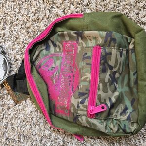 JURASSIC WORLD Vibrant Green and Pink Backpack with Camouflage Accents